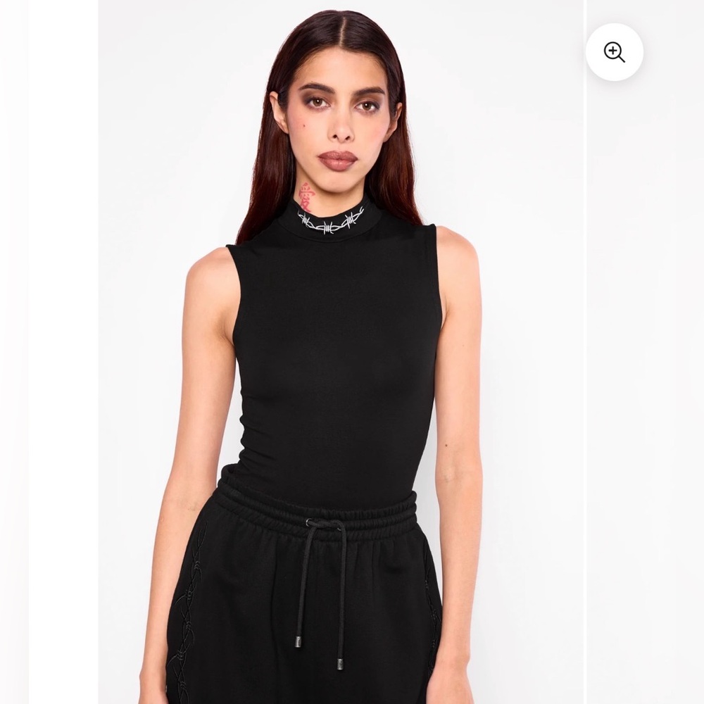 Mary Wyatt London bound high neck top